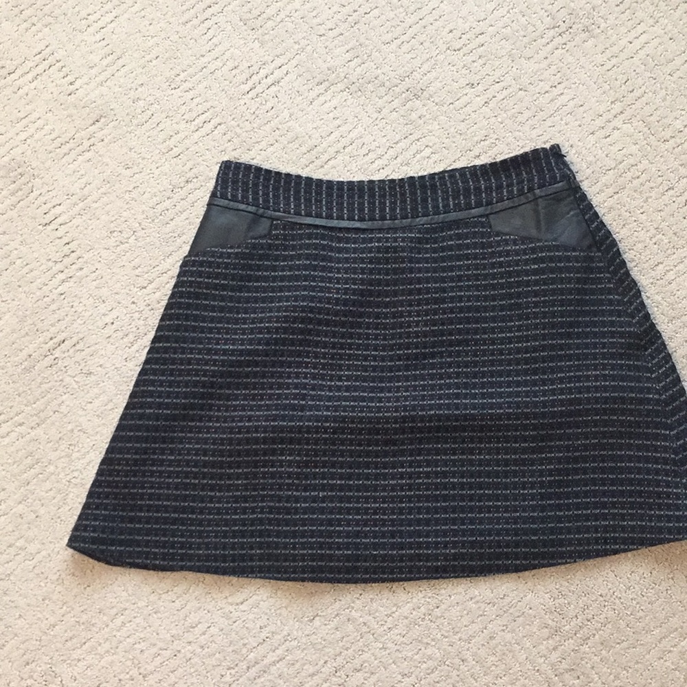 Tweed mini skirt with faux leather trim